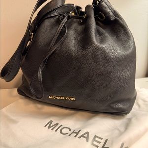 Michael Kors lady’s hand bag with the original dust cover